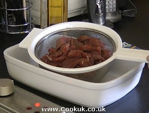 Rinsing off marinade from stewing steak