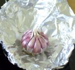 Garlic bulb in foil for roasting